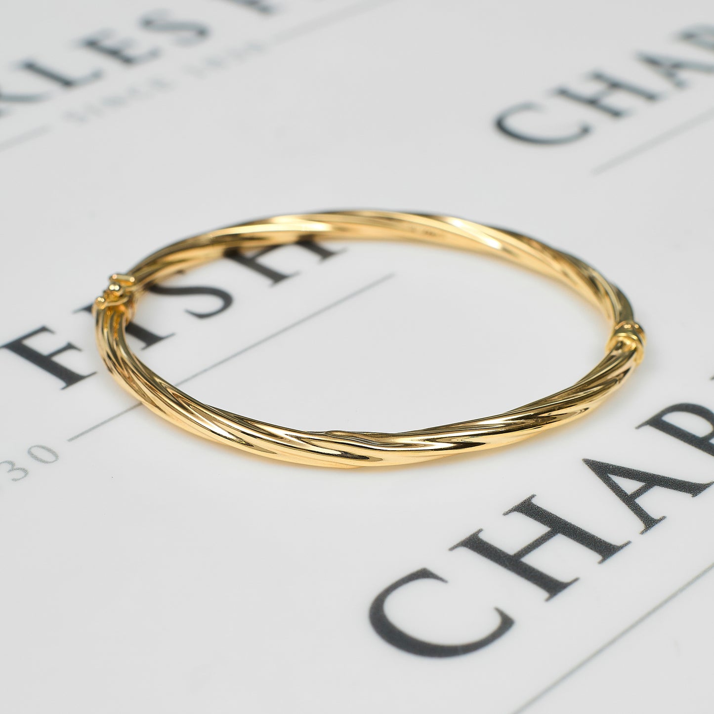 Pre-Owned 9ct Gold Hinged Twist Design Bangle