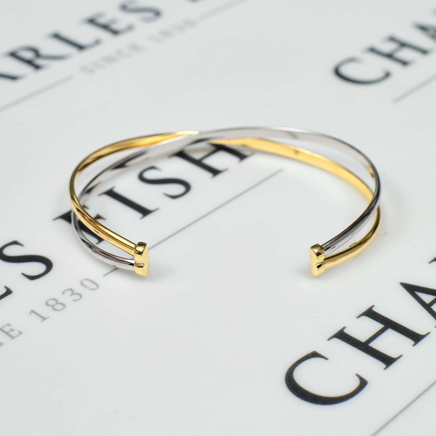 Pre-Owned 9ct Gold 2 Tone Open Ended Crossover Bangle