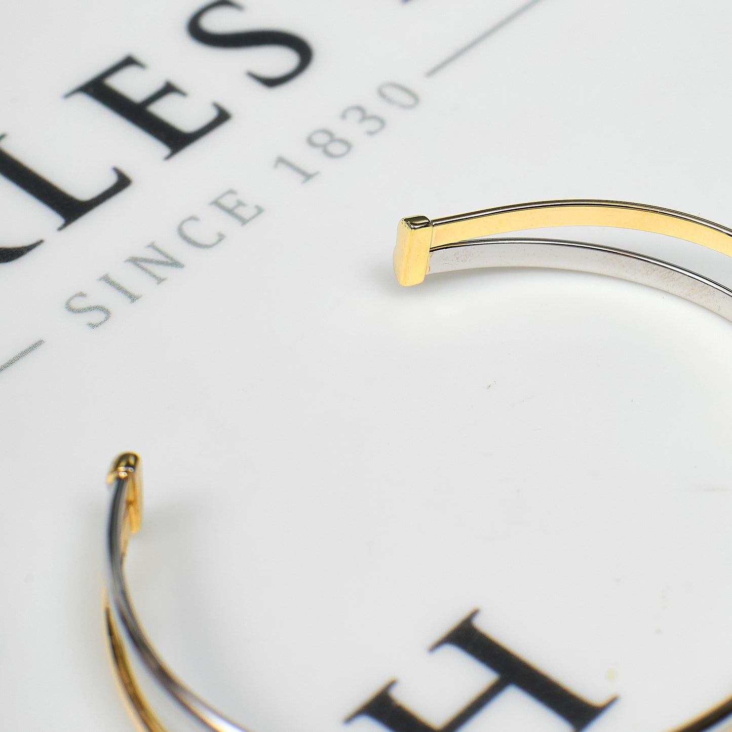 Pre-Owned 9ct Gold 2 Tone Open Ended Crossover Bangle