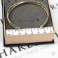 Pre-Owned 9ct Gold 2 Tone Open Ended Crossover Bangle