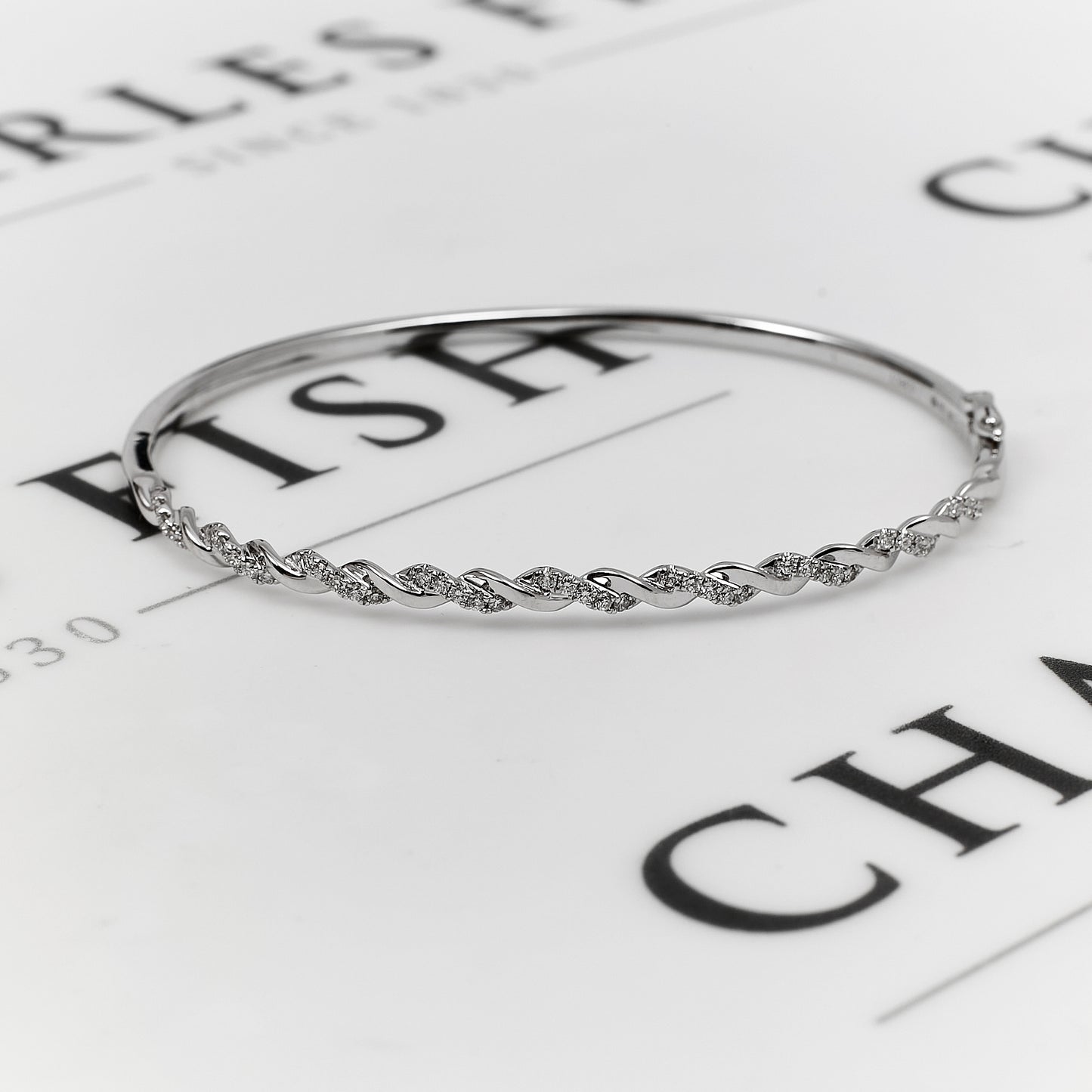 Pre-Owned 18ct White Gold Diamond Set Twist Hinged Bangle
