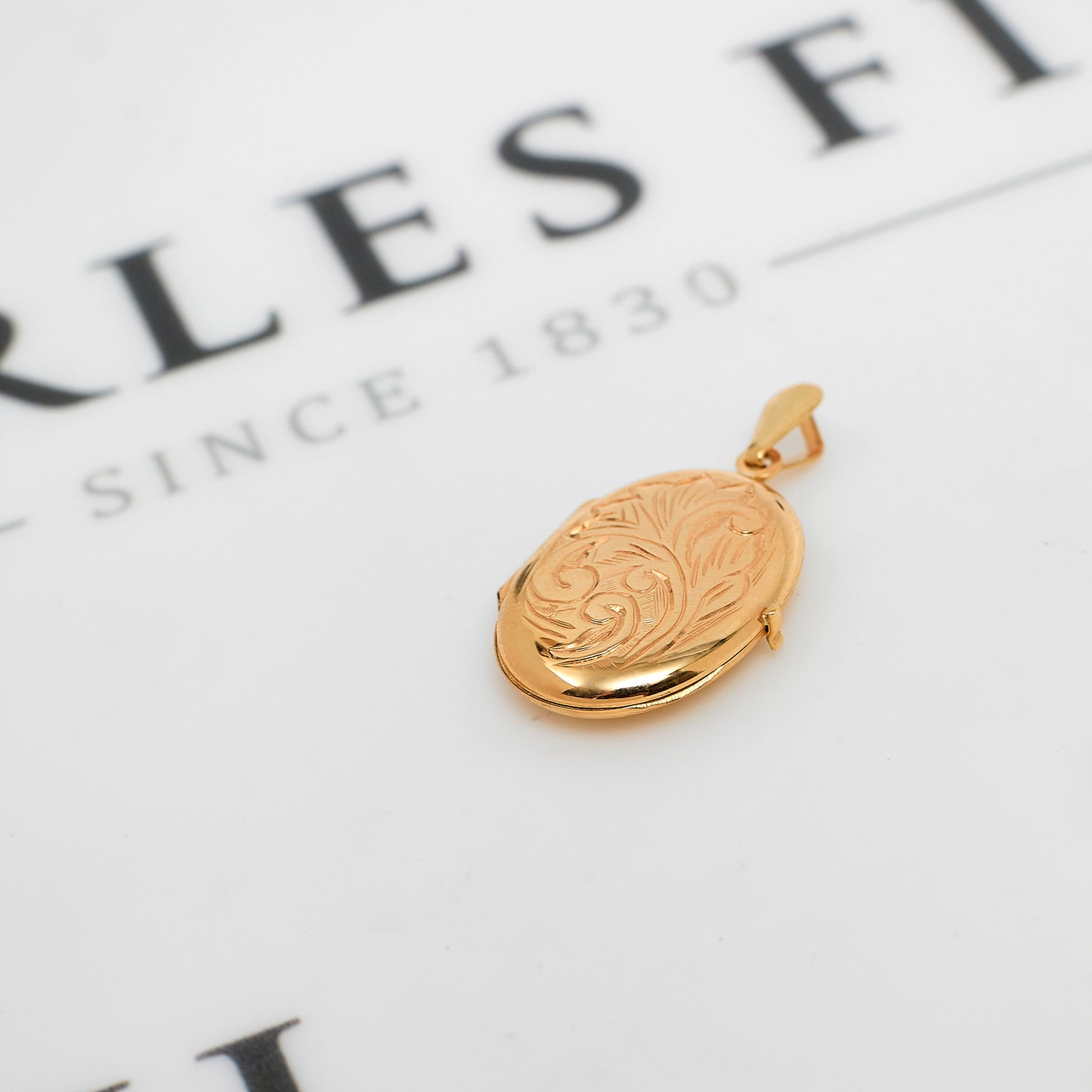 Pre-Owned 9ct Gold Oval Swirl Locket Pendant