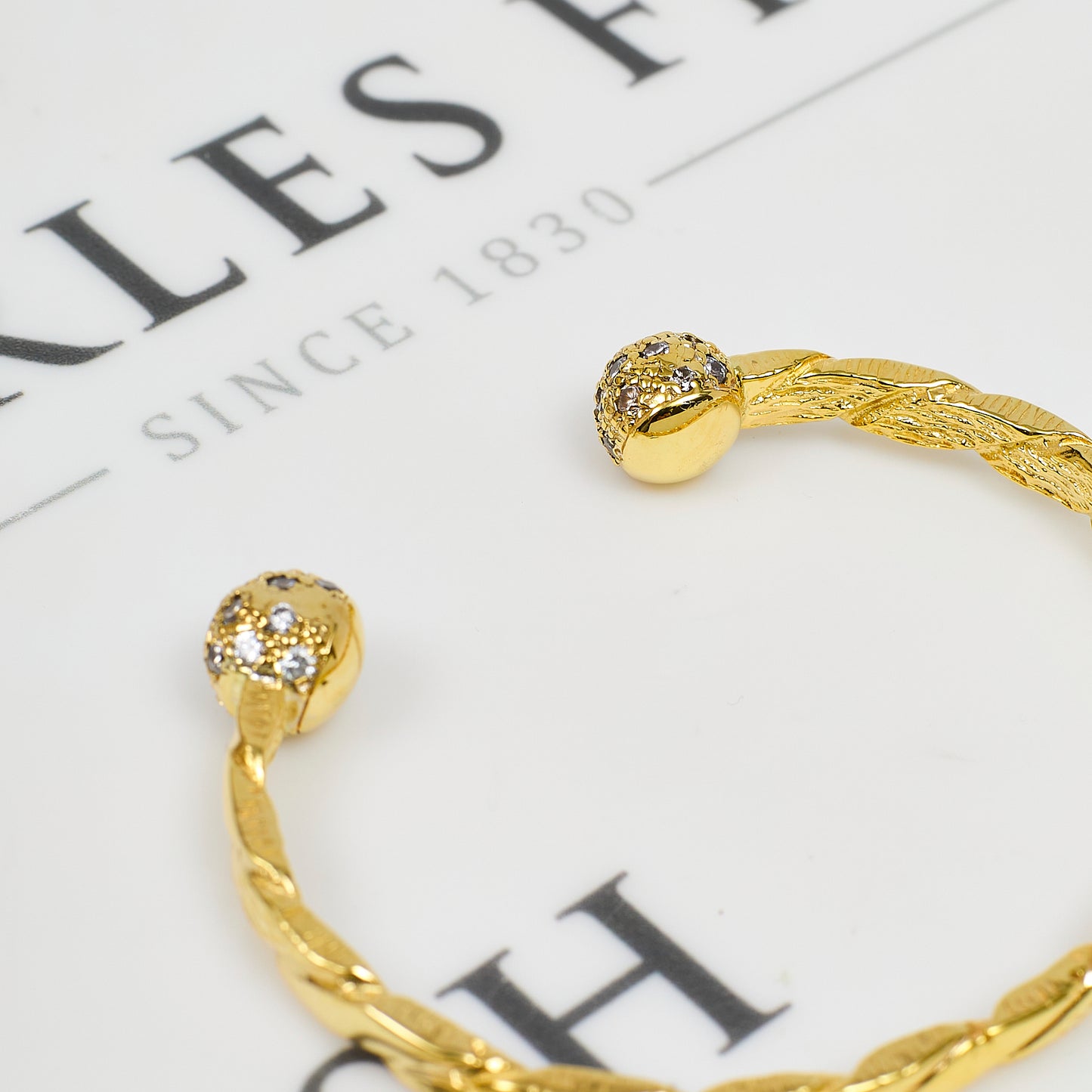 Pre-Owned 9ct Gold CZ Twist Torque Bangle