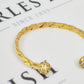 Pre-Owned 9ct Gold CZ Twist Torque Bangle