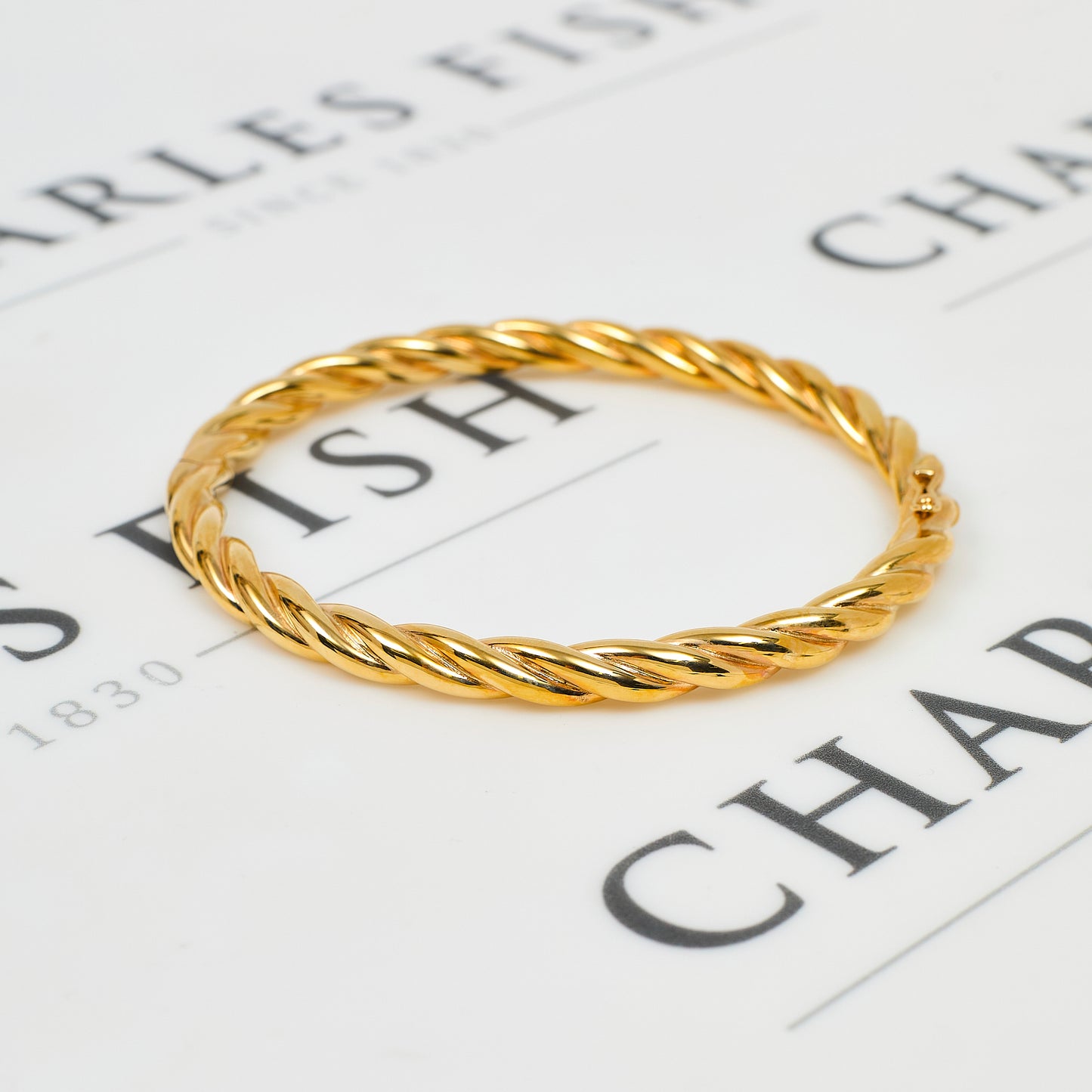 Pre-Owned 9ct Gold Hinged Twist Design Bangle