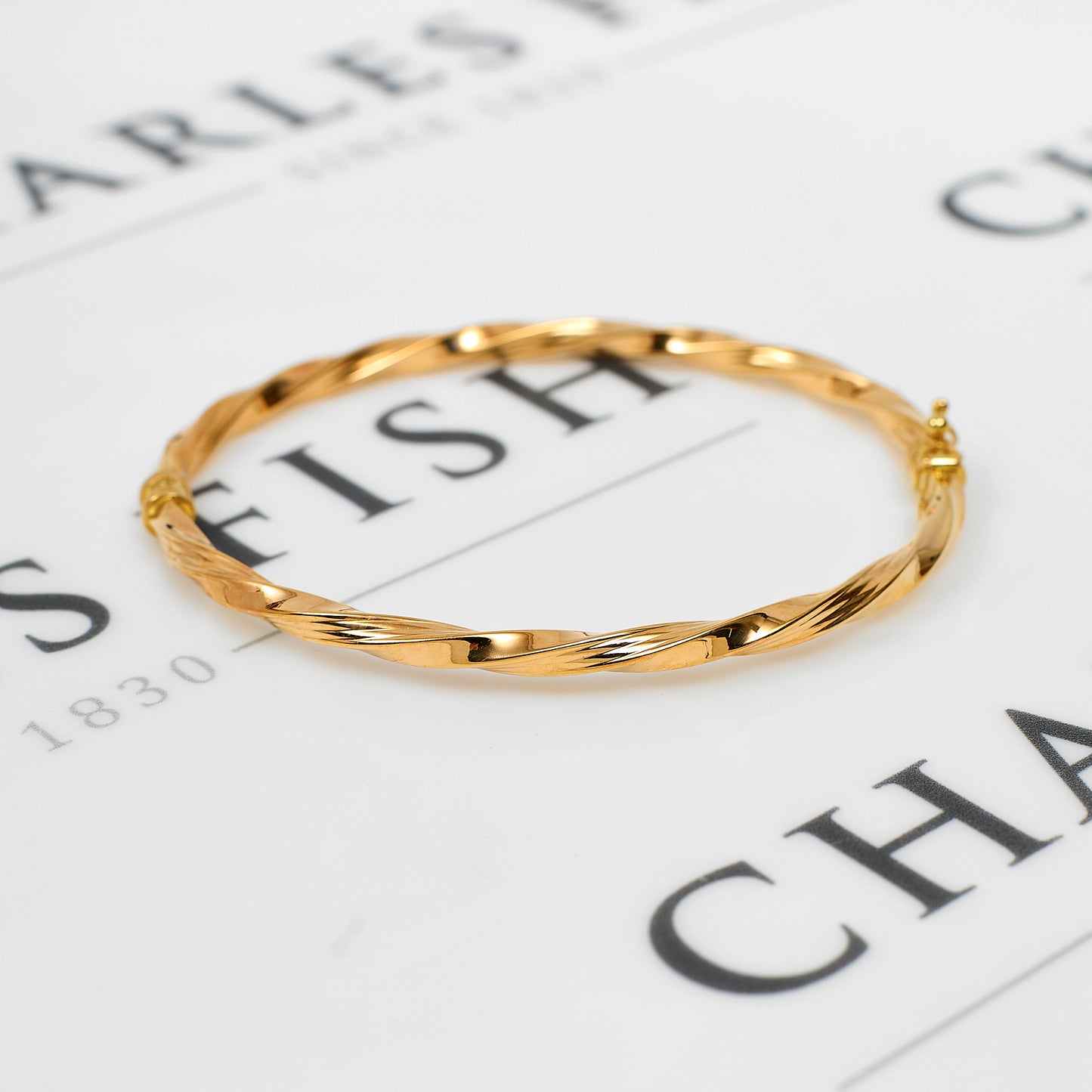 Pre-Owned 9ct Gold Hinged Twist Bangle