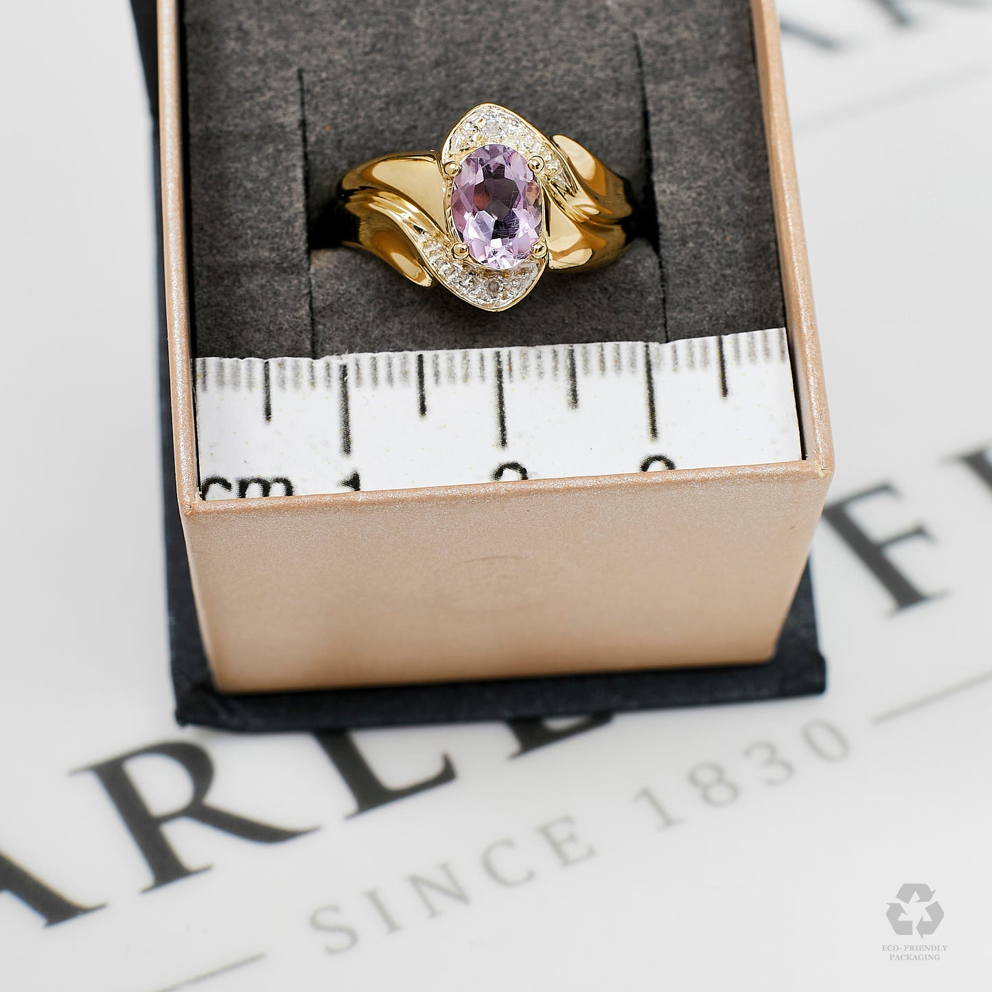 Pre-Owned 9ct Gold Oval Amethyst & Diamond Twist Design Ring
