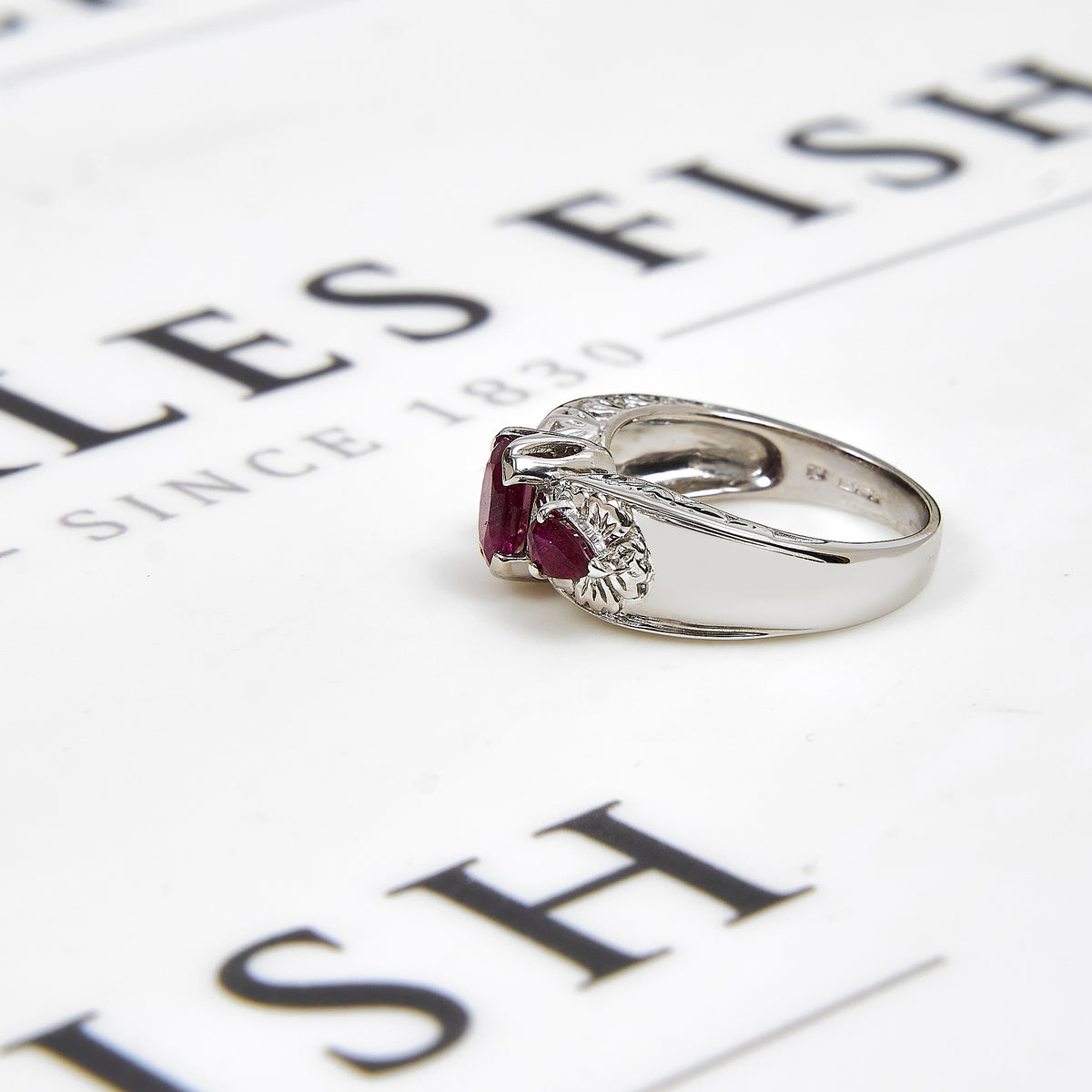 Pre-Owned 9ct White Gold 3 Ruby Dress Ring Size M.5