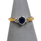 Pre-Owned 18ct Gold Oval Sapphire & 2 Diamond Ring Size K.5