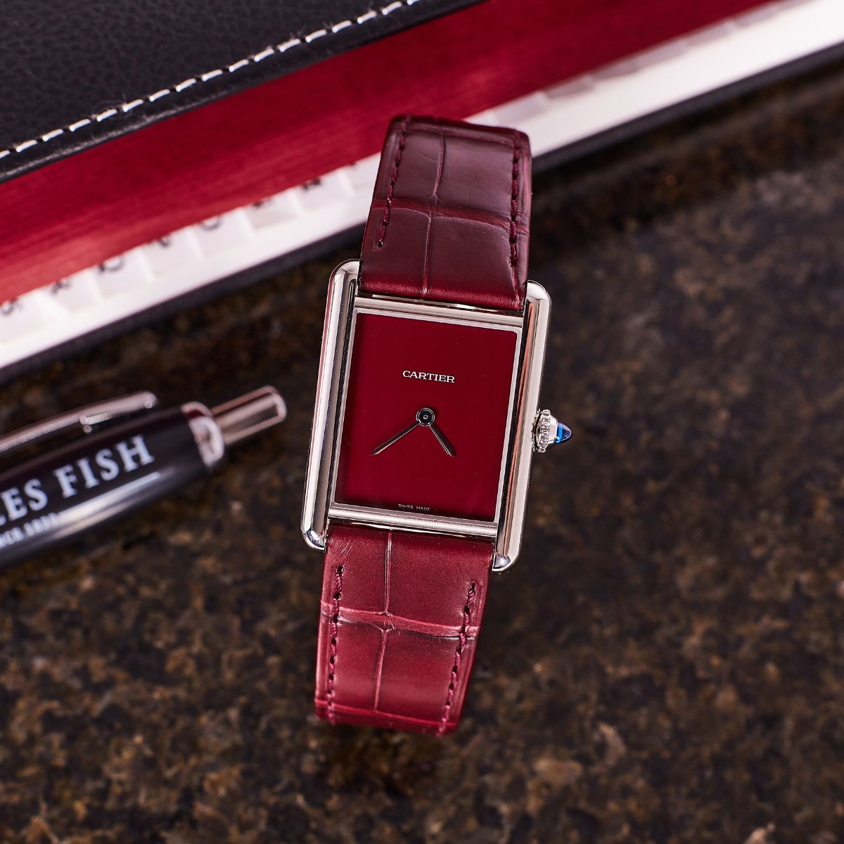 Cartier Tank Must with crimson dial and burgundy leather strap