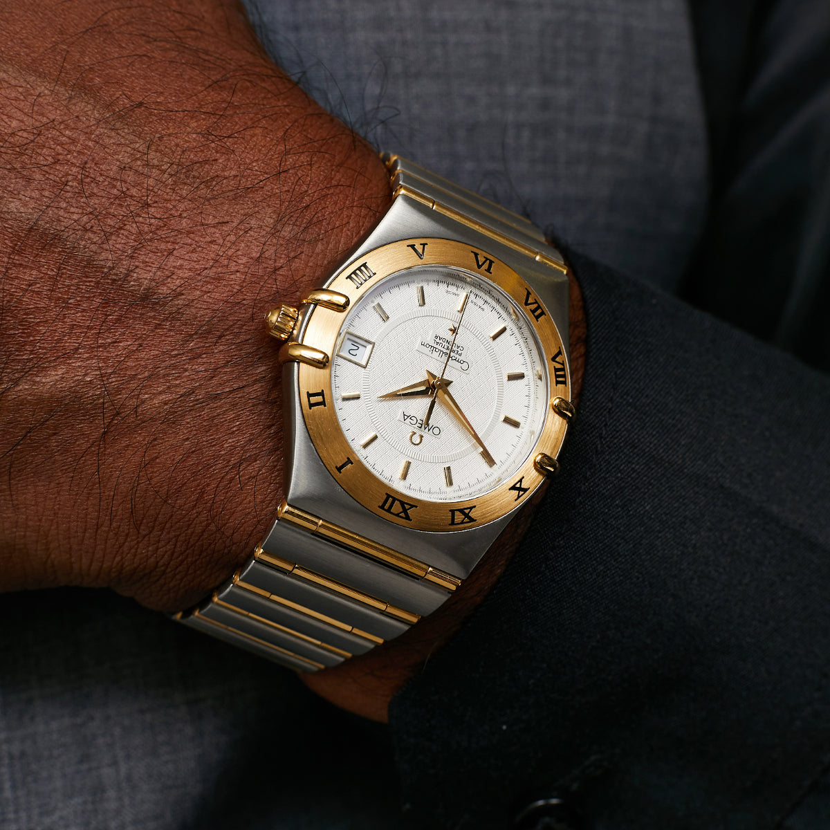 Omega Constellation two-tone watch on wrist