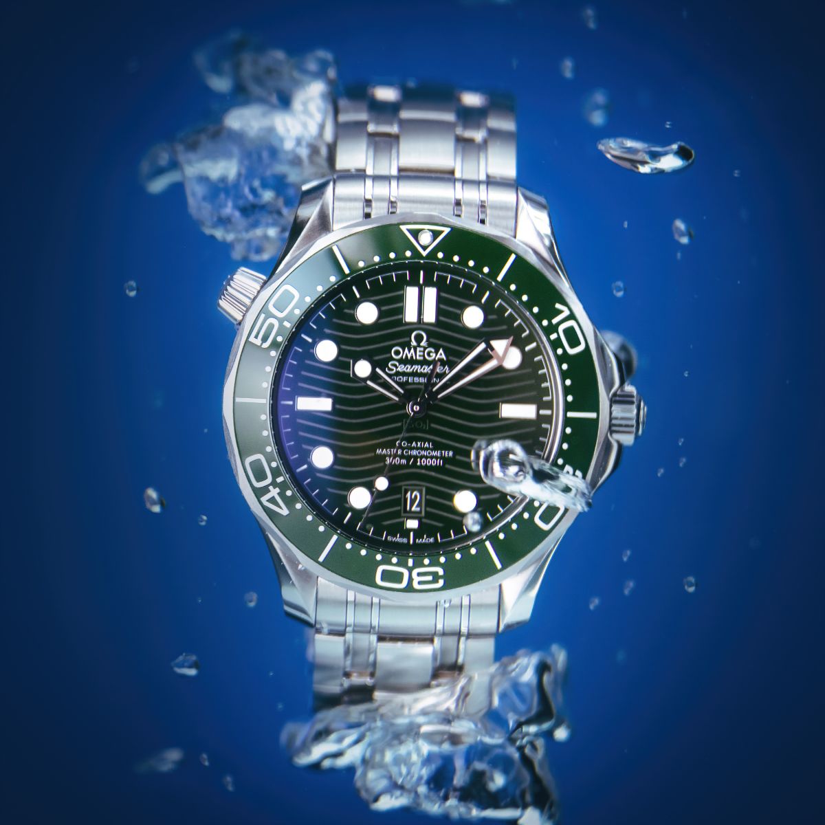 Omega Seamaster Professional 300m green ceramic bezel watch with water splash